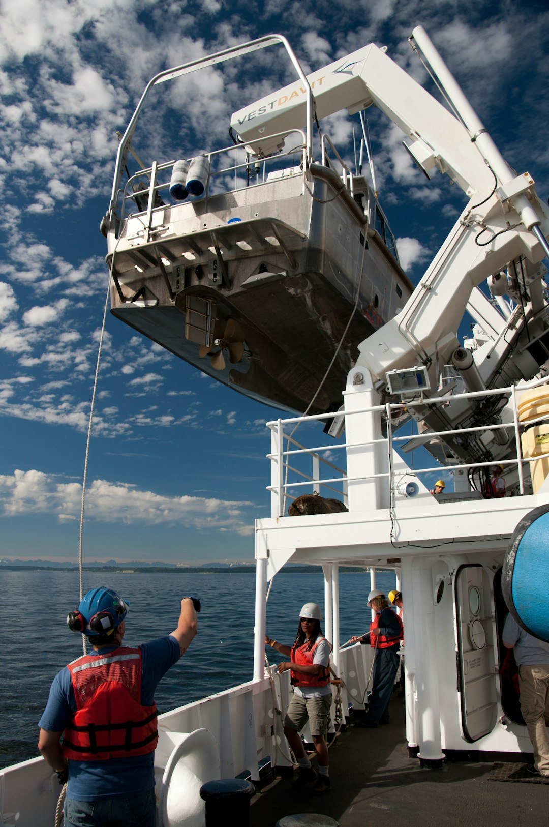 our-mission Preparing to launch a NOAA ship RAINIER survey launch.